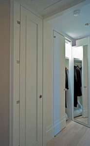 closet doors in an art collector's apartment at the Mandarin Oriental in Boston, designed by Steven Elmets Architecture