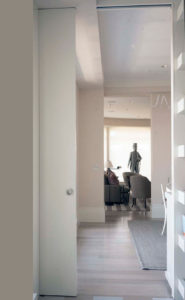 hallway in an art collector's apartment at the Mandarin Oriental in Boston, designed by Steven Elmets Architecture