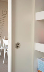 door detail in an art collector's apartment at the Mandarin Oriental in Boston, designed by Steven Elmets Architecture