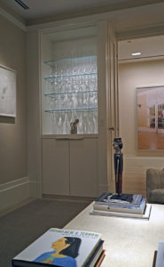 library in an art collector's apartment at the Mandarin Oriental in Boston, designed by Steven Elmets Architecture