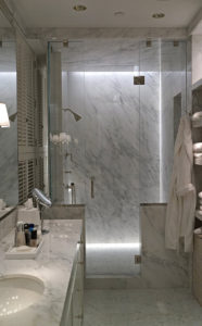 master bathroom in an art collector's apartment at the Mandarin Oriental in Boston, designed by Steven Elmets Architecture