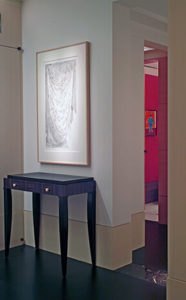 Entry hall with view to powder room for a private residence in the Mandarin Oriental, Boson designed by Steven Elmets Architecture