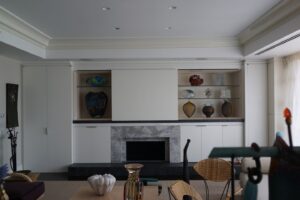 Living room in a glass collector's apartment in the Mandarin Oriental, designed by Steven Elmets Architecture