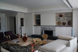 Living room in a glass collector's apartment in the Mandarin Oriental, designed by Steven Elmets Architecture