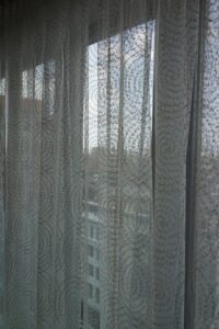 Curtain Details in a glass collector's apartment in the Mandarin Oriental, designed by Steven Elmets Architecture