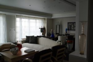 Living room in a glass collector's apartment in the Mandarin Oriental, designed by Steven Elmets Architecture