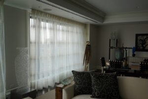 Curtain details in a glass collector's apartment in the Mandarin Oriental, designed by Steven Elmets Architecture