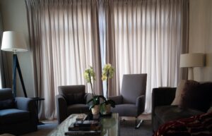 Living room curtain detail in NYC apartment designed and furnished by Steven Elmets Architecture