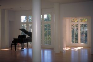 Piano room of a home in Atlanta, Georgia designed by Steven Elmets Architecture