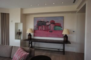 living room art display in an art collector's apartment at the Mandarin Oriental in Boston, designed by Steven Elmets Architecture