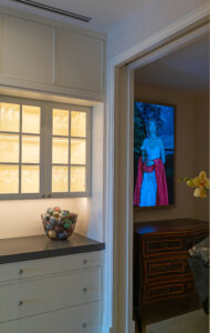 kitchen art display and storage in an art collector's apartment at the Mandarin Oriental in Boston, designed by Steven Elmets Architecture